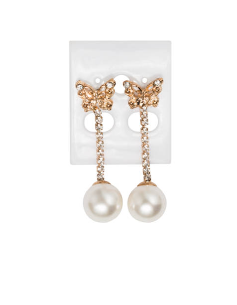 istock Pearl earrings isolated on white background 682640860