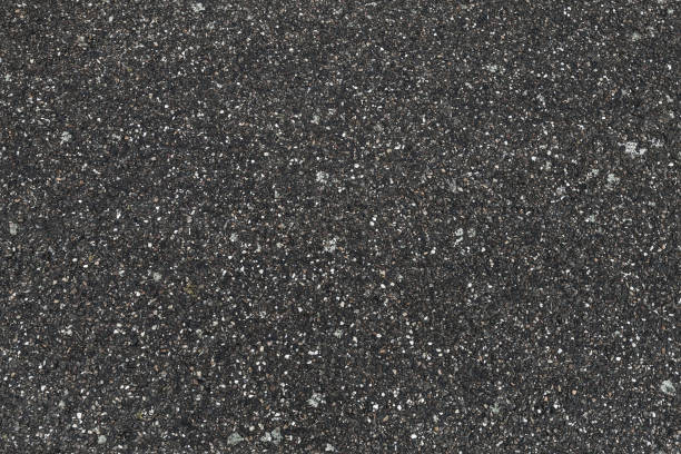 istock Rural road pavement, dark rough asphalt 682645596