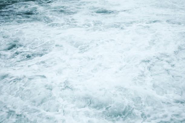 istock Sea water surface with foam and waves 682646028