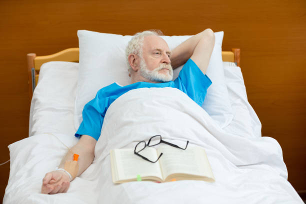 istock Senior man in hospital bed 682651742