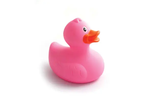 Children bath toy rubber ducky. Macro, close up view.