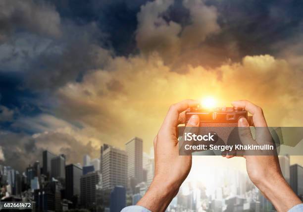 Man With Camera In Hands Stock Photo - Download Image Now - Adult, Business, Business Finance and Industry