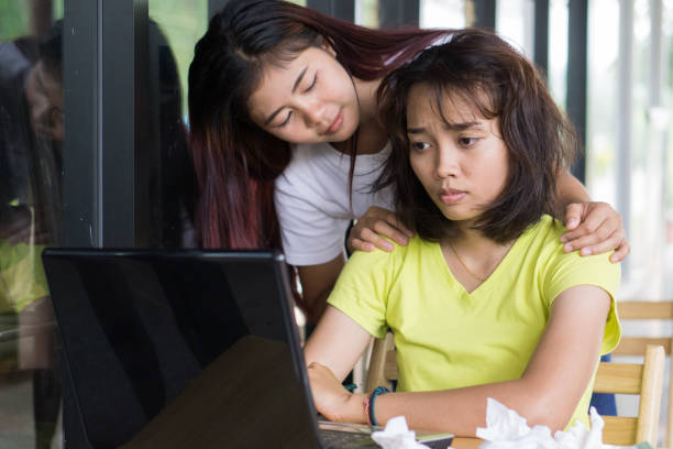 istock Asian women students are concerned about stress. With exam preparation 682669300