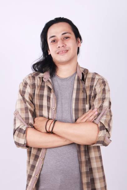 istock Happy Asian Young Man With Long Hair 682676180