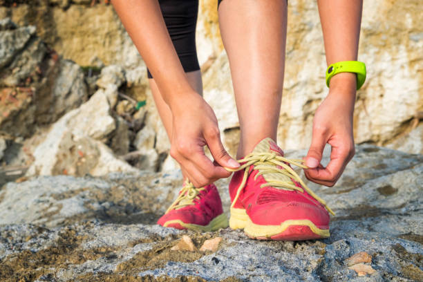 istock Woman trying the shoestrings 682679892