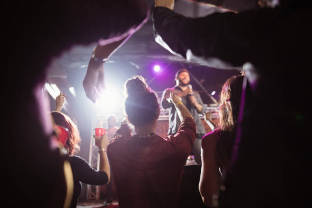 istock Crowd enjoying music concert 682682374