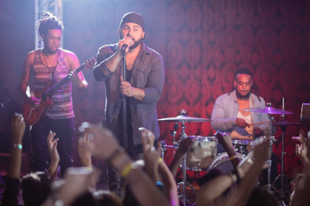 istock Male musicians performing at nightclub 682682450