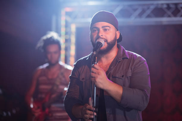 istock Male singer singing at nightclub 682682530