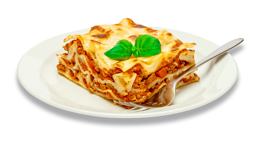 Portion of tasty lasagn, isolated on white background