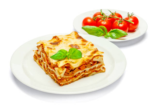 istock Portion of tasty lasagna isolated on white 682692470