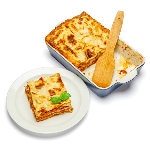 istock Portion of tasty lasagna isolated on white 682692556