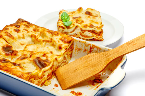 istock Portion of tasty lasagna isolated on white 682692908