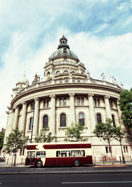 istock Saint Stephen's basilica and tour bus in Budapest, photo filter 682696578