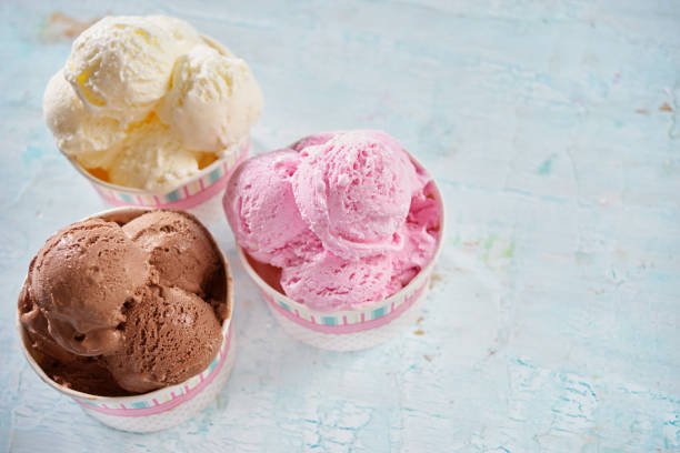 istock Chocolate, vanilla and strawberry ice cream. 682697482
