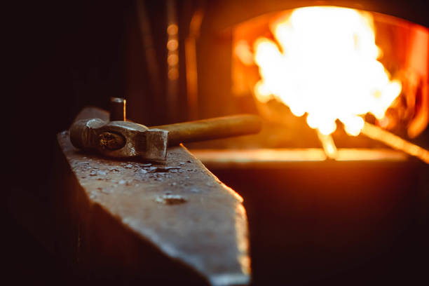 Tools in the forge Hand anvil. hummers all blacksmith tools in forge. arm hammer stock pictures, royalty-free photos & images