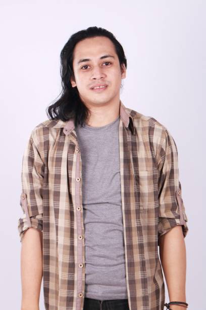 istock Happy Asian Young Man With Long Hair 682703884