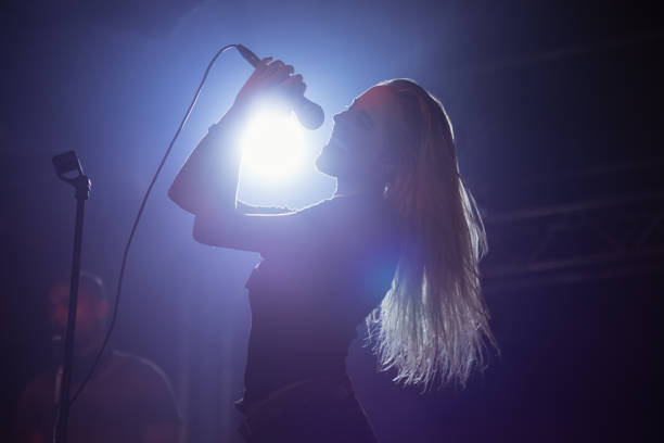 istock Cheerful female singer at nightclub 682704308