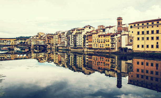 Ponte Vecchio and historical buildings, river Arno, Florence
