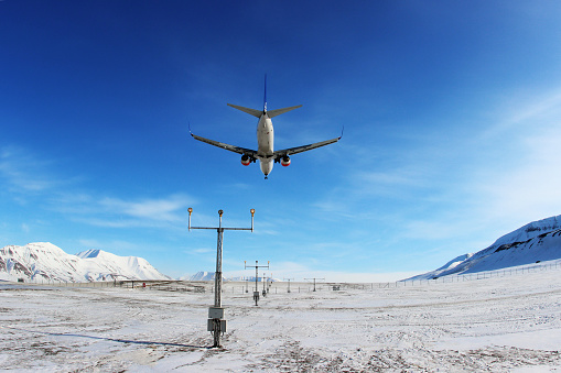 Longyearbyen, Svalbard, Norvay - April 19, 2013: SAS - Scandinavian Airlines Boeing 737-800 LN-RRE landing at Svalbard airport.