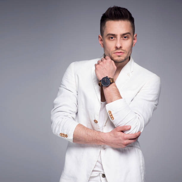 istock Attractive man in a white suit 682733344