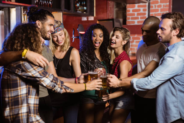 istock Cheerful friends toasting beer glasses 682742488