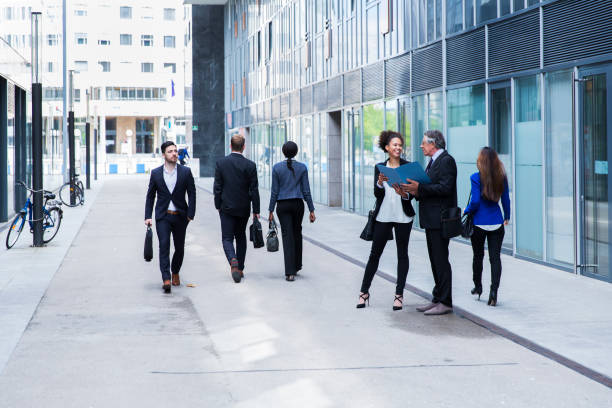 istock Business people walking on a street 682746208