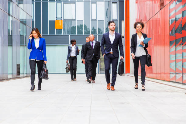istock Business people walking on a street 682746496