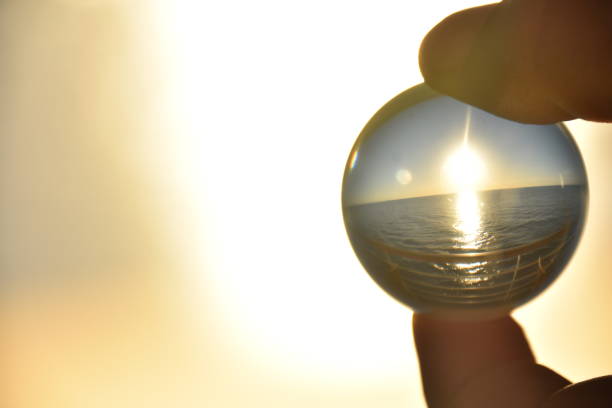 istock Sunset in the sea through a crystal ball 682759332