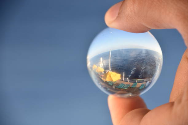istock Sunset in the sea through a crystal ball 682759450