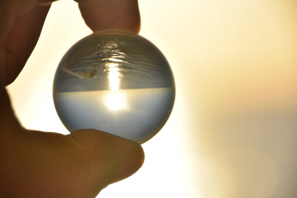 istock Sunset in the sea through a crystal ball 682759480