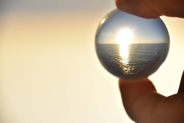 istock Sunset in the sea through a crystal ball 682759578