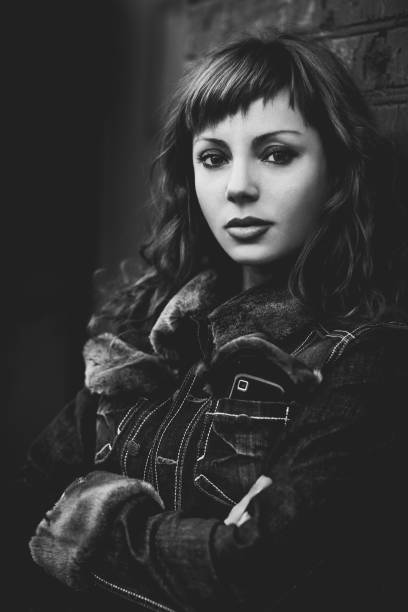 istock Young woman outdoors portrait 682762396