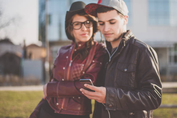 istock Young couple at staying in the park 682766618