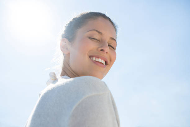 istock Low angle portrait of smiling woman 682772878