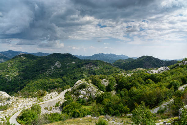 istock Mountain landscape and road in summer 682776392