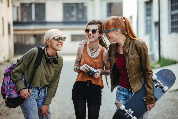 istock Girlfriends laughing together and going to have fun 682797618