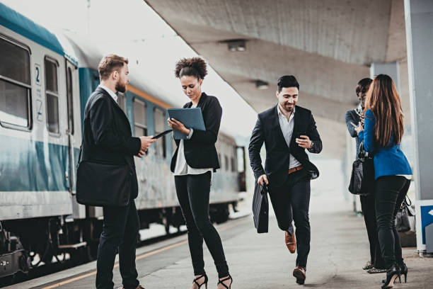 istock Young Businessman trying to catch the train 682800746