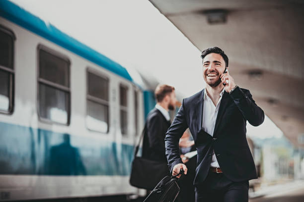 istock Young Businessman trying to catch the train 682800772