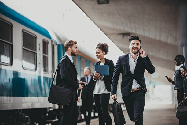 istock Young Businessman trying to catch the train 682800806