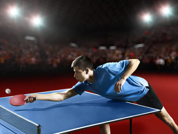 istock Young ping pong player playing table tennis game 682820144