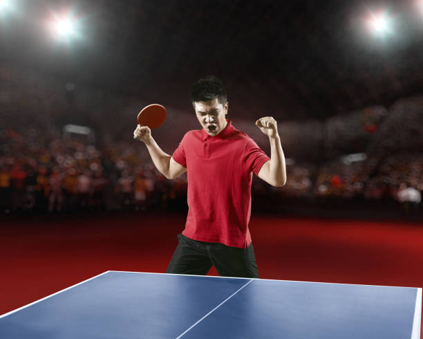 istock Young asian ping pong player rejoices in his victory 682820146