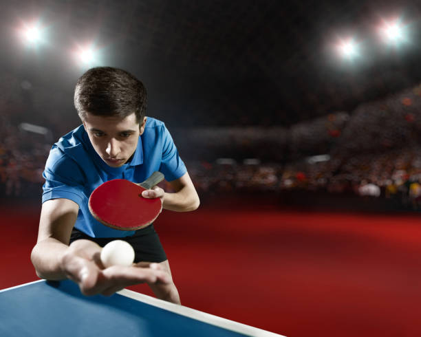 istock Young ping pong player playing table tennis game 682820156