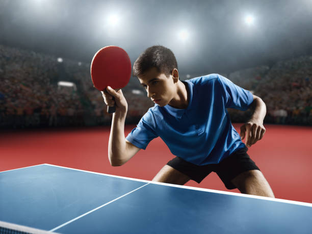 istock Young ping pong player playing table tennis game 682820206