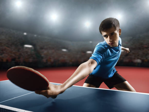 istock Young ping pong player playing table tennis game 682820212