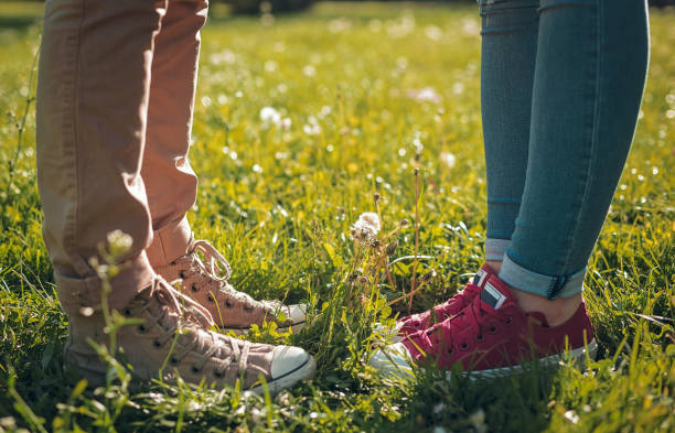 istock Love couple legs in sneakers 682821832