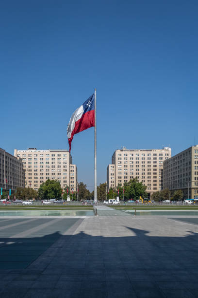 istock Chilean Flag in front of La Moneda Palace - Santiago, Chile 682838436
