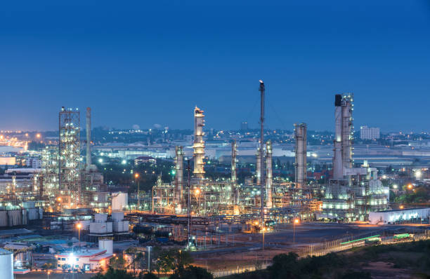 istock Oil refinery industry at night 682839164