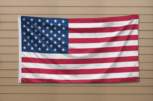 Flag of United States hanging on a wall