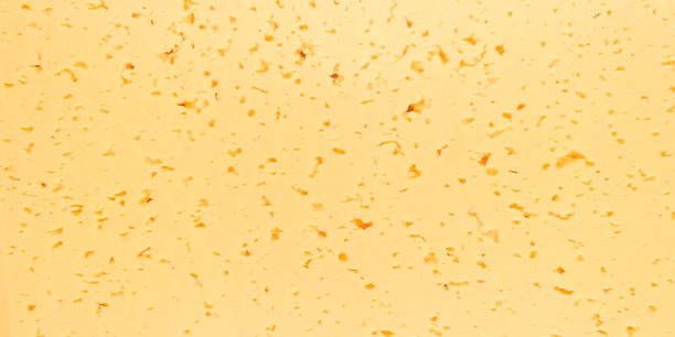 The texture of the sliced cheese.
