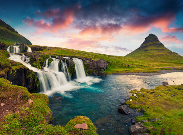 istock Summer sunset on famous Kirkjufellsfoss Waterfall 682869844